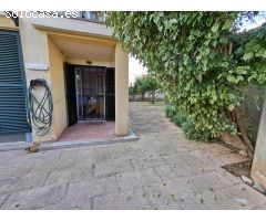Oasis de tranquilidad en Sa Torre: Planta baja con terraza y jardín