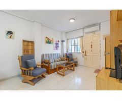 Acogedor Bungalow en Planta Baja con Jardín y Piscina Comunitaria en Torreblanca, Torrevieja