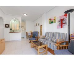 Acogedor Bungalow en Planta Baja con Jardín y Piscina Comunitaria en Torreblanca, Torrevieja