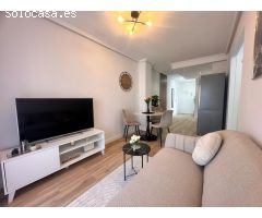 Apartamento con piscina y nueva reforma: 2 dormitorios, 500 m. desde la playa
