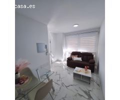 Bonito bajo completamente reformado de un dormitorio a 400 metros de playa