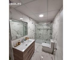 Bonito bajo completamente reformado de un dormitorio a 400 metros de playa