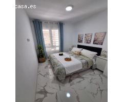 Bonito bajo completamente reformado de un dormitorio a 400 metros de playa