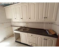Bajo con 2 habitaciones,1 baño y patio con jardín