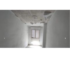 Piso de tres dormitorios
