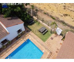 CHALET CONVERTIDO EN APARTAMENTOS
