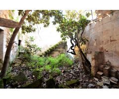 Casa en el centro de Muro con mucho carácter mallorquín, jardín y garaje.