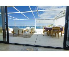 Ático en 1º línea de playa con terraza de 144m² y vistas panorámicas