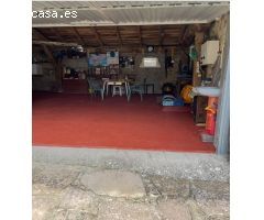TERRENO URBANO CON UN ALMACÉN DE 113 M2 EN POLACIONES