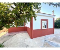 ZONA LA PERLA - Parcela de terreno de 1.200 m2 con casa  de 3 habitaciones.