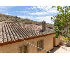 Finca con frutales, vistas y construcciones