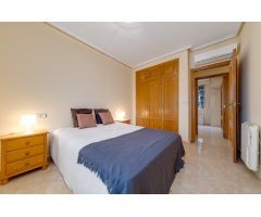 CASA SEMI INDEPENDIENTE DE 2 DORMITORIOS CON PISCINA Y PLAZA DE PARKING EN AGUAS NUEVAS TORREVIEJA