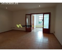 Amplia casa con jardín