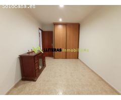 Amplia casa con jardín