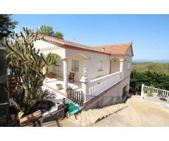 Impresionante Casa a Cuatro Vientos en Olivella con Vistas a la Montaña