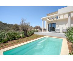 Mallorca, Cala Romántica, se vende pareado de obra nueva con 2 habitaciones y piscina comunitaria