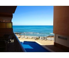 En 1º linea de playa con piscina
