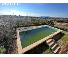 CASA CON TERRENO Y PISCINA