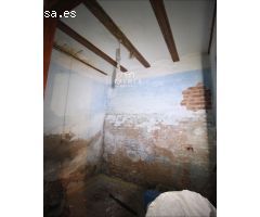 CASA CÉNTRICA CON MUCHAS POSIBILIDADES