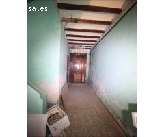 CASA CÉNTRICA CON MUCHAS POSIBILIDADES
