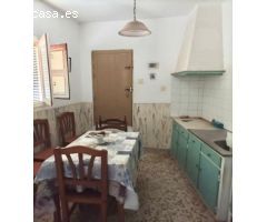 CASA CON TERRENO