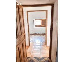 CASA CON TERRENO