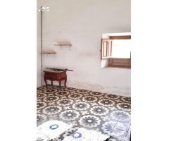 CASA CON TERRENO