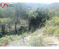 Terreno con vistas al mar y montaña en  urbanización Los Jardines, Cunit