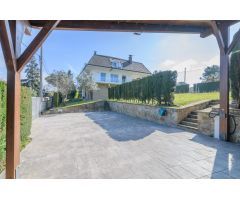 Espectacular casa con jardín