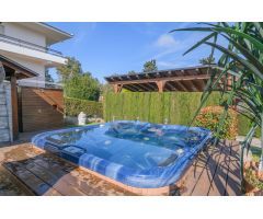 Espectacular casa con jardín