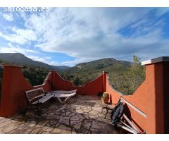 Bonito chalet, original, con amplio jardín y vistas preciosas en las montañas en Planes del Rei