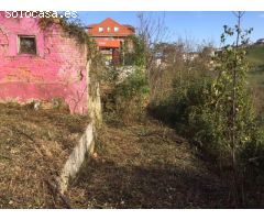 Parcela edificable con casa en ruinas