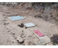 Finca en la montaña con agua