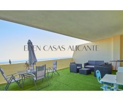 Piso de 2 dormitorios 2 baños con gran terraza con vistas al mar, piscina comunitaria y parking