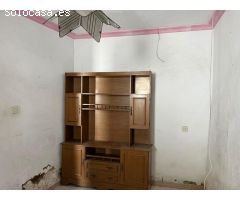 Gran casa de pueblo en el centro de Santa Olalla. Ideal inversor!!