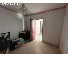 Gran casa de pueblo en el centro de Santa Olalla. Ideal inversor!!