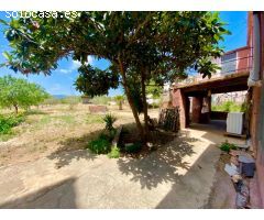Casa de pueblo con gran terreno