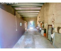 Casa de pueblo con gran terreno