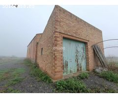 Finca de regadío con almacenes en venta en Alcoletge.