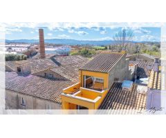¡Descubre Tu Nuevo Hogar en La Bisbal! – Espaciosa Vivienda con Local Comercial y Garaje