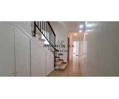 Vivienda adosada de tres niveles