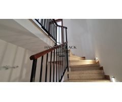 Vivienda adosada de tres niveles