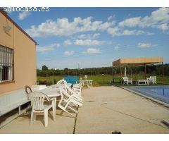Gran parcela en Aznalcazar con nave y piscina!!!