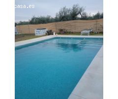 Gran parcela en Aznalcazar con nave y piscina!!!
