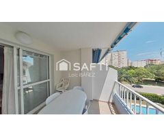 Luminoso apartamento con terraza, garaje y piscina en Playa de Gandía