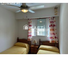 Luminoso apartamento con terraza, garaje y piscina en Playa de Gandía