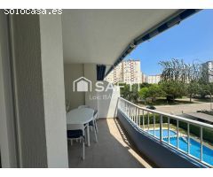 Luminoso apartamento con terraza, garaje y piscina en Playa de Gandía