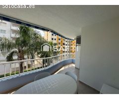 Luminoso apartamento con terraza, garaje y piscina en Playa de Gandía