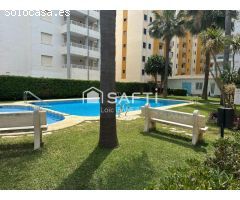 Luminoso apartamento con terraza, garaje y piscina en Playa de Gandía