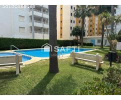 Luminoso apartamento con terraza, garaje y piscina en Playa de Gandía